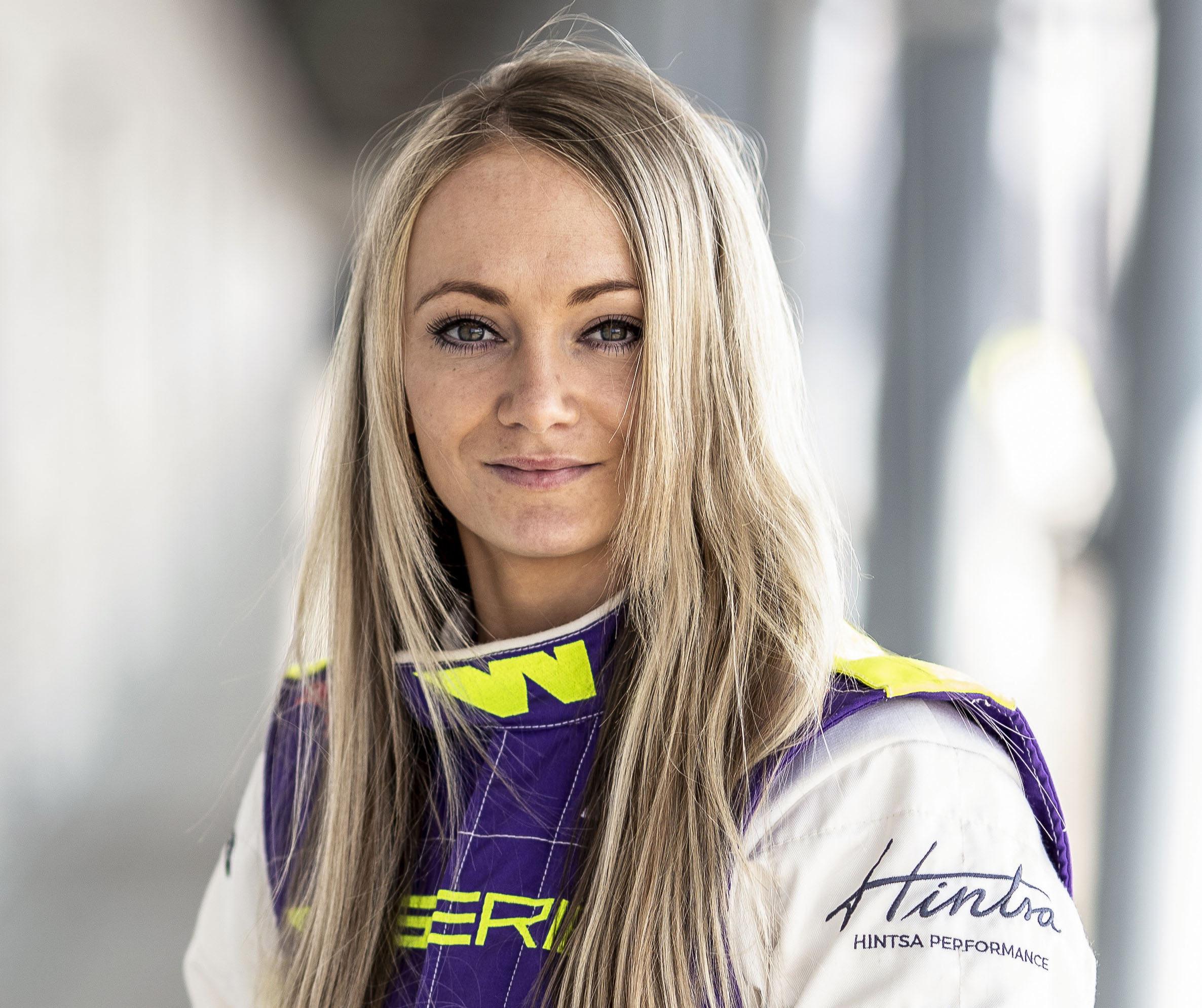 HOYERSWERDA, GERMANY - APRIL 16: Driver Jessica Hawkins of UK poses for a photo during W Series testing at Lausitzring on April 16, 2019 in Hoyerswerda, Germany. W Series aims to give female drivers an opportunity in motorsport that hasn’t been available to them before. The first race of the series, which encompasses six rounds on the DTM support programme, is at the Hockenheimring on May 3rd and 4th.  (Photo by Maja Hitij/Getty Images)
